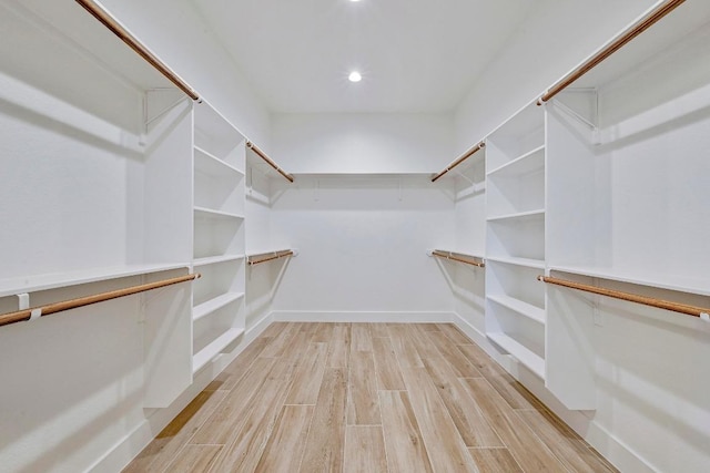 2803 Wilson Ave, Lago Vista, TX 78645 - walk in closet with light wood-style flooring