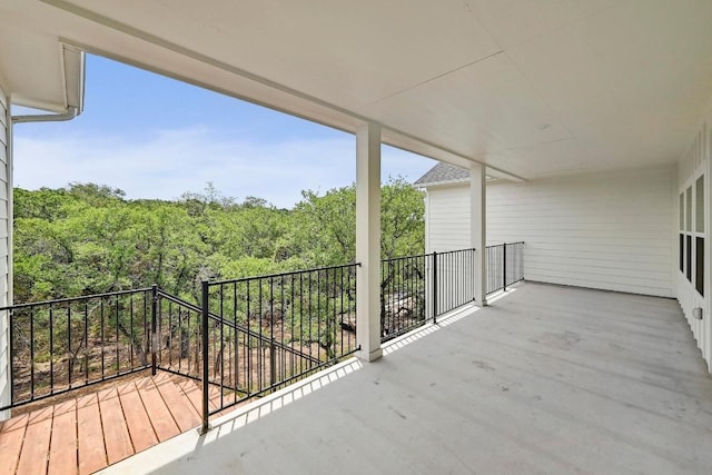 2803 Wilson Ave, Lago Vista, TX 78645 - balcony featuring a view of trees