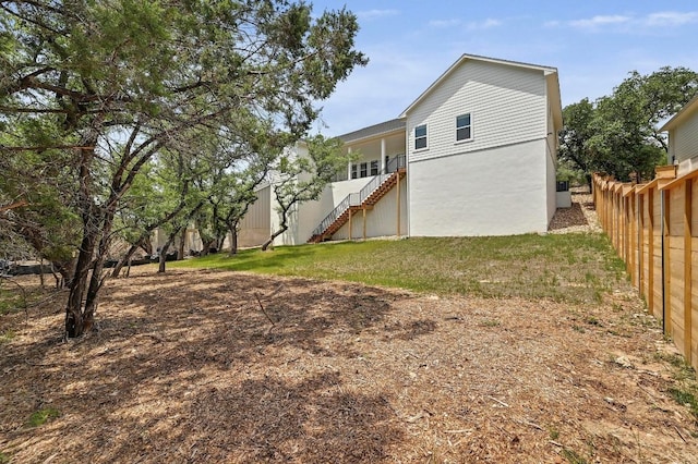 2803 Wilson Ave, Lago Vista, TX 78645 - rear view of house with stairway