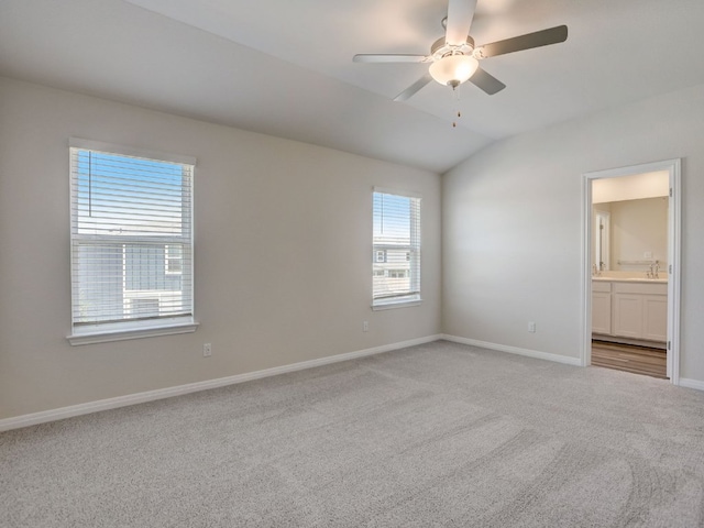 1850 Settlers Glen Dr Unit 502, Round Rock, TX 78665 - empty room featuring light colored carpet, lofted ceiling, a ceiling fan, and baseboards