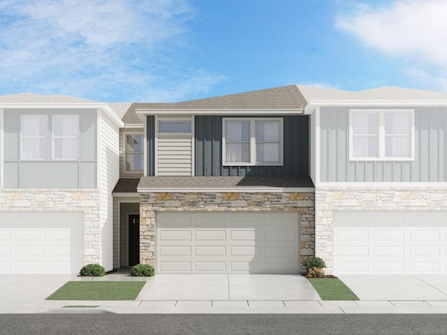1850 Settlers Glen Dr Unit 502, Round Rock, TX 78665 - multi unit property with board and batten siding, a garage, driveway, stone siding, and roof with shingles