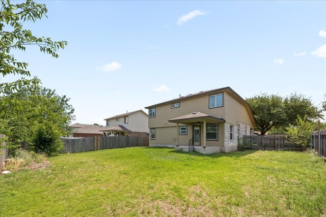 15411 Ora Ln, Pflugerville, TX 78660 - back of property with a fenced backyard