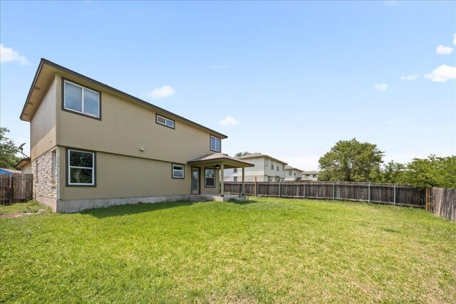 15411 Ora Ln, Pflugerville, TX 78660 - back of property with a fenced backyard