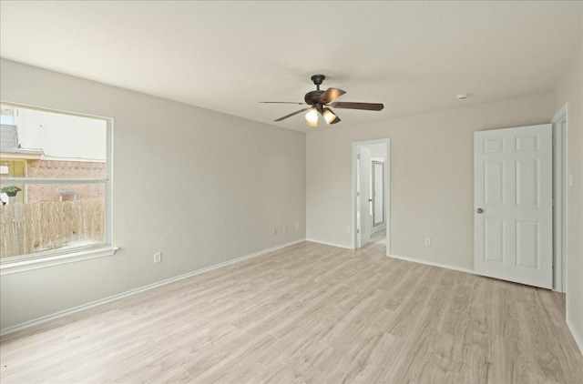 15411 Ora Ln, Pflugerville, TX 78660 - empty room featuring light wood-type flooring and a ceiling fan