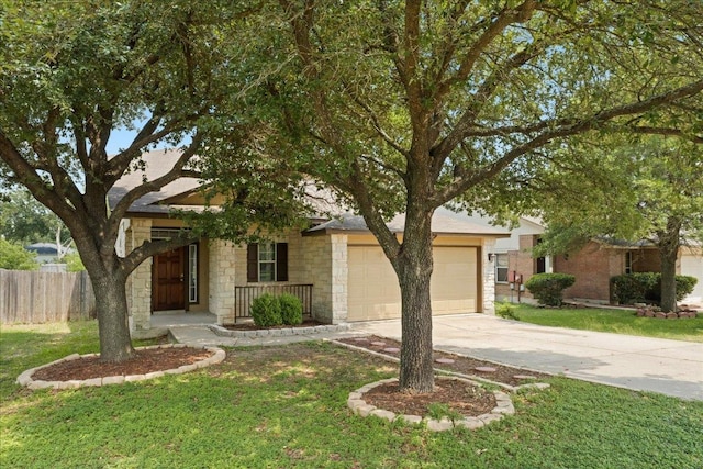 15411 Ora Ln, Pflugerville, TX 78660 - view of property hidden behind natural elements featuring stone siding, driveway, and an attached garage