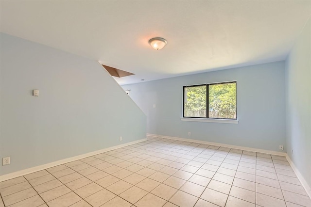 8524 Dryfield Dr, Austin, TX 78758 - unfurnished room with light tile patterned flooring and baseboards