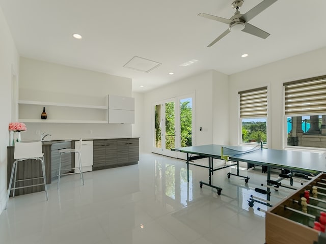 1001 Marly Way, Austin, TX 78733 - playroom featuring light tile patterned flooring, recessed lighting, and ceiling fan