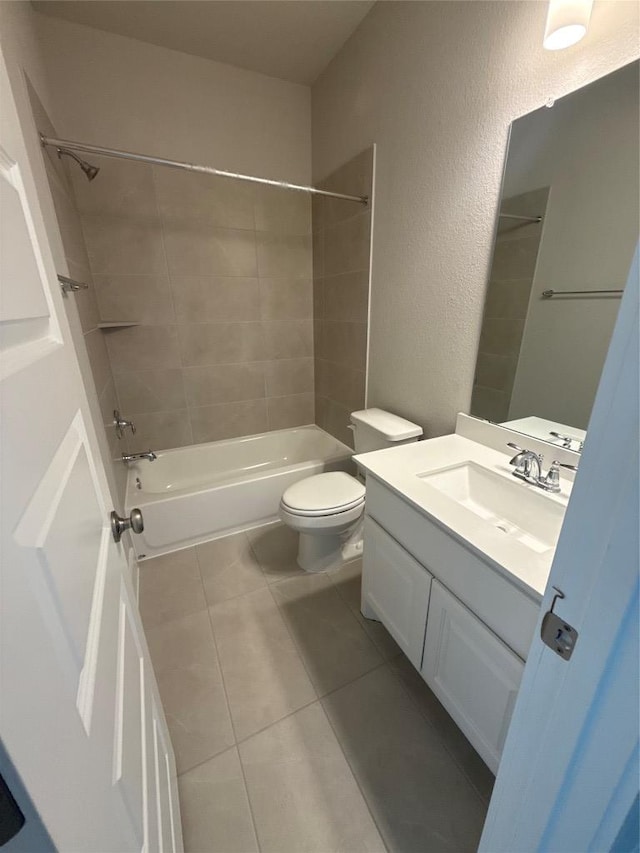 1101 Blanket Flower Dr, Georgetown, TX 78628 - full bathroom featuring shower / bath combination, vanity, toilet, tile patterned flooring, and a textured wall