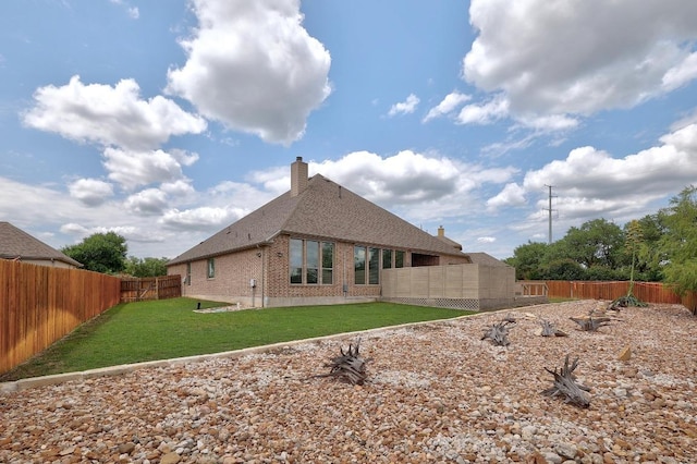 22218 W Cape Travis Bnd, Lago Vista, TX 78645 - back of property featuring brick siding, a fenced backyard, a chimney, and roof with shingles