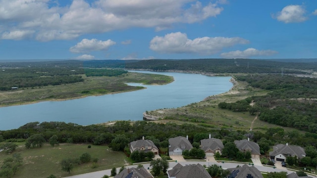 22218 W Cape Travis Bnd, Lago Vista, TX 78645 - aerial view of residential area featuring a nearby body of water and a forest