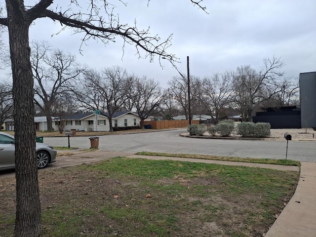 7520 Delafield Ln, Austin, TX 78752 - view of yard with a residential view and fence