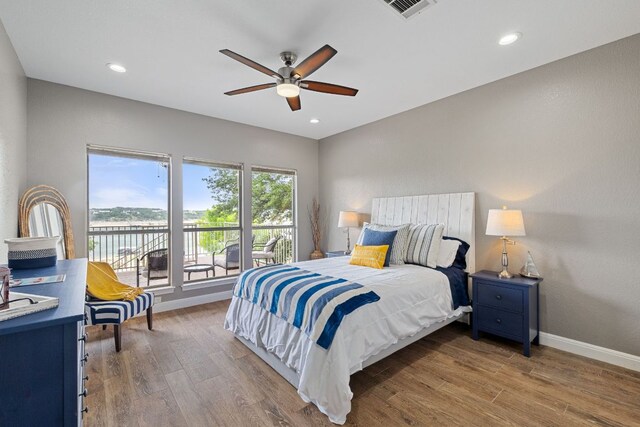 212 Lakefront Dr, Point Venture, TX 78645 - bedroom with baseboards, wood finished floors, access to exterior, recessed lighting, and a ceiling fan