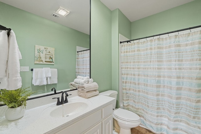 212 Lakefront Dr, Point Venture, TX 78645 - bathroom featuring toilet, vanity, and a shower with curtain
