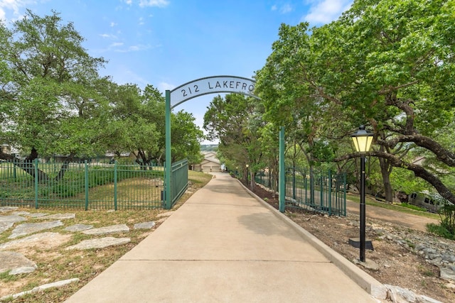 212 Lakefront Dr, Point Venture, TX 78645 - view of property's community featuring fence and a gate