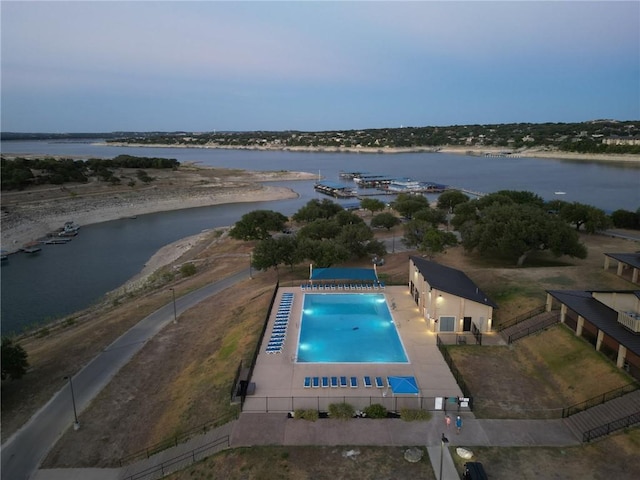 212 Lakefront Dr, Point Venture, TX 78645 - aerial view of property and surrounding area with a large body of water and a pool area