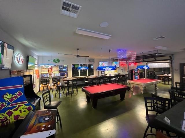212 Lakefront Dr, Point Venture, TX 78645 - rec room featuring billiards, finished concrete floors, and a ceiling fan