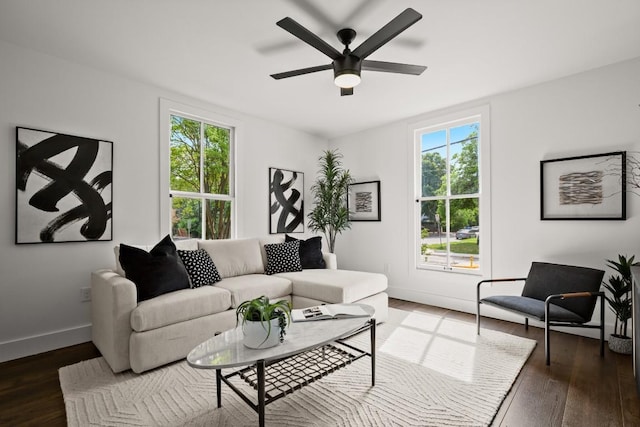 48 Chicon St, Austin, TX 78702 - living room with a ceiling fan, dark wood-style floors, and baseboards