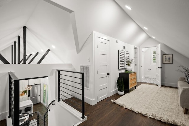 48 Chicon St, Austin, TX 78702 - interior space featuring vaulted ceiling, wood finished floors, baseboards, and recessed lighting