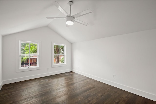 48 Chicon St, Austin, TX 78702 - additional living space featuring vaulted ceiling, dark wood finished floors, baseboards, and ceiling fan