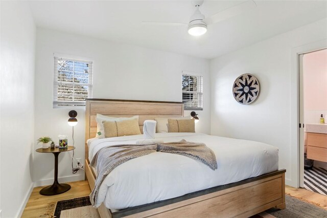 10226 Parsons Rd, Manor, TX 78653 - bedroom featuring wood finished floors, ceiling fan, and baseboards