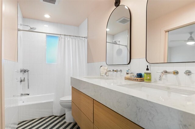 10226 Parsons Rd, Manor, TX 78653 - full bathroom with shower / bathtub combination with curtain, toilet, double vanity, and decorative backsplash