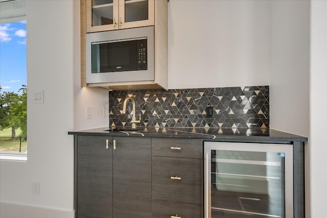 98 Wennmohs Pl, Horseshoe Bay, TX 78657 - indoor bar with wine cooler, built in microwave, backsplash, and healthy amount of natural light