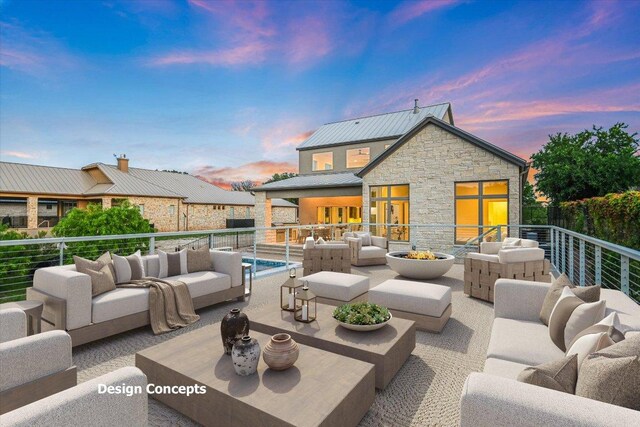 98 Wennmohs Pl, Horseshoe Bay, TX 78657 - patio terrace at dusk featuring an outdoor hangout area and a balcony