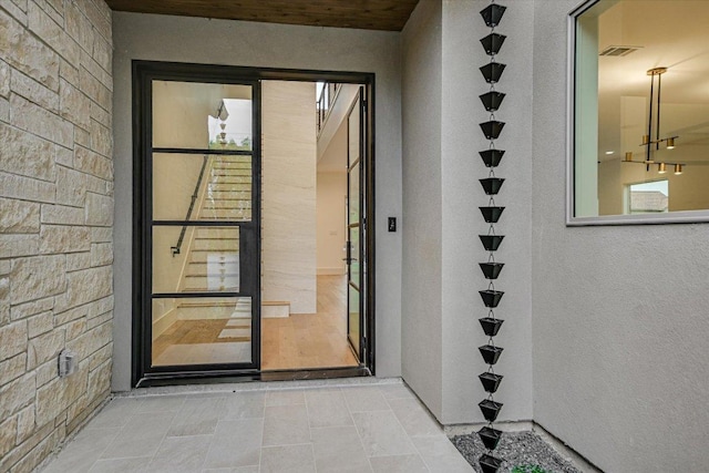 98 Wennmohs Pl, Horseshoe Bay, TX 78657 - doorway to property featuring stucco siding
