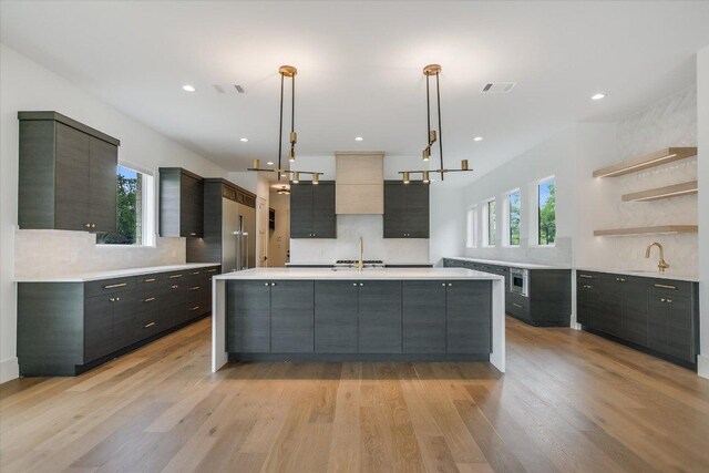 98 Wennmohs Pl, Horseshoe Bay, TX 78657 - kitchen featuring a sink, modern cabinets, light countertops, and recessed lighting