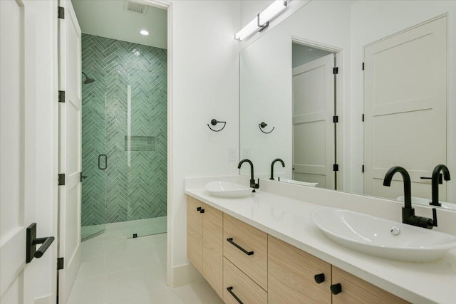 98 Wennmohs Pl, Horseshoe Bay, TX 78657 - full bath with a stall shower, double vanity, and tile patterned floors