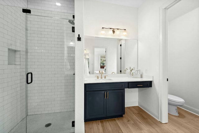 300 Barrel Bnd, Georgetown, TX 78628 - full bath with a stall shower, wood finished floors, and vanity