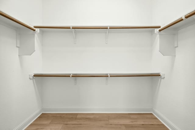 300 Barrel Bnd, Georgetown, TX 78628 - spacious closet featuring light wood-style floors