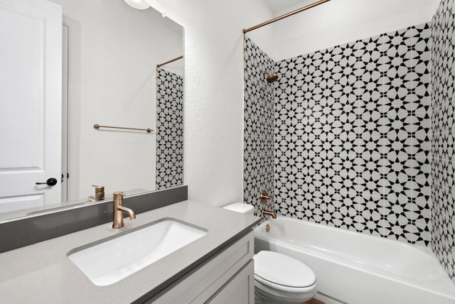300 Barrel Bnd, Georgetown, TX 78628 - bathroom with bathtub / shower combination, vanity, and a textured wall