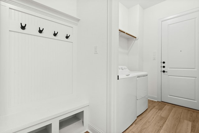 300 Barrel Bnd, Georgetown, TX 78628 - laundry area with washing machine and clothes dryer and light wood-style flooring
