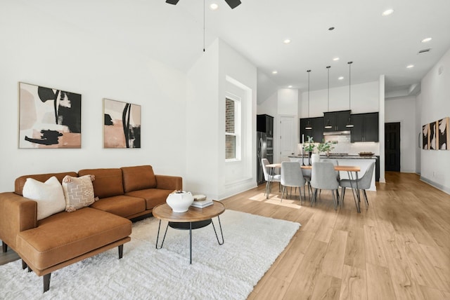 300 Barrel Bnd, Georgetown, TX 78628 - living area with recessed lighting, light wood finished floors, and ceiling fan