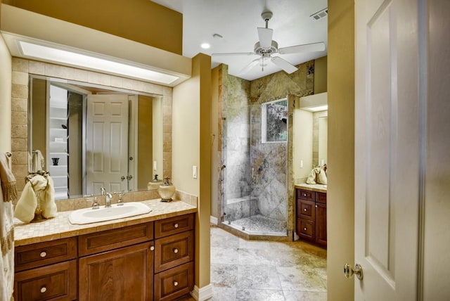 3211 Constitution Dr, Lago Vista, TX 78645 - full bathroom with vanity, a stall shower, and ceiling fan