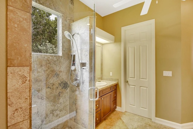 3211 Constitution Dr, Lago Vista, TX 78645 - full bathroom with walk in shower, vanity, and a ceiling fan