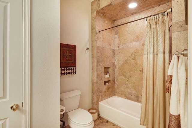 3211 Constitution Dr, Lago Vista, TX 78645 - bathroom featuring shower / bathtub combination with curtain and toilet