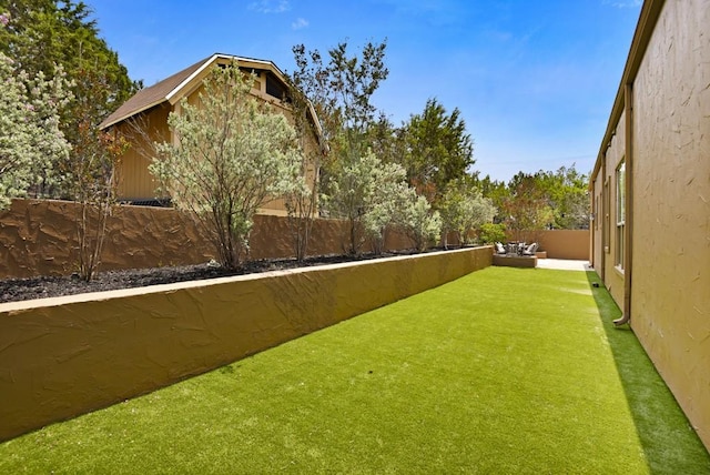 3211 Constitution Dr, Lago Vista, TX 78645 - fenced backyard with outdoor lounge area