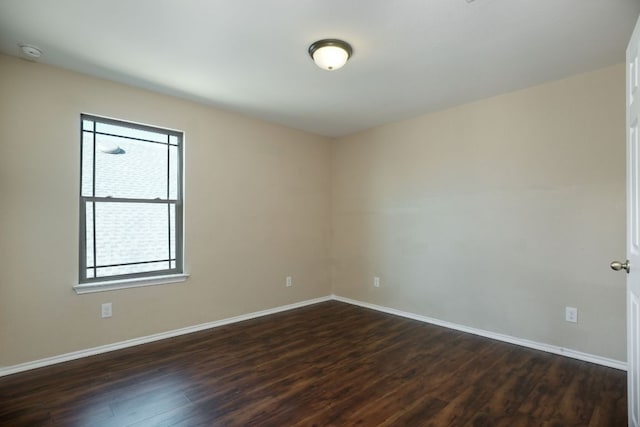 1244 Yellow Iris Rd, Leander, TX 78641 - unfurnished room featuring plenty of natural light, dark wood-type flooring, and a smoke detector