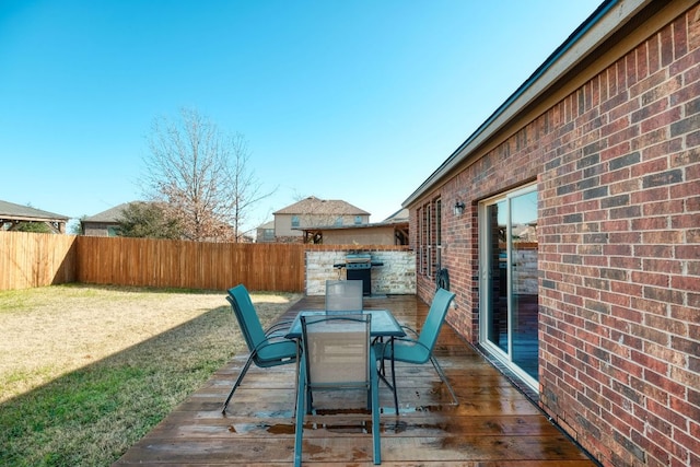1244 Yellow Iris Rd, Leander, TX 78641 - deck featuring a fenced backyard, outdoor dining space, and grilling area