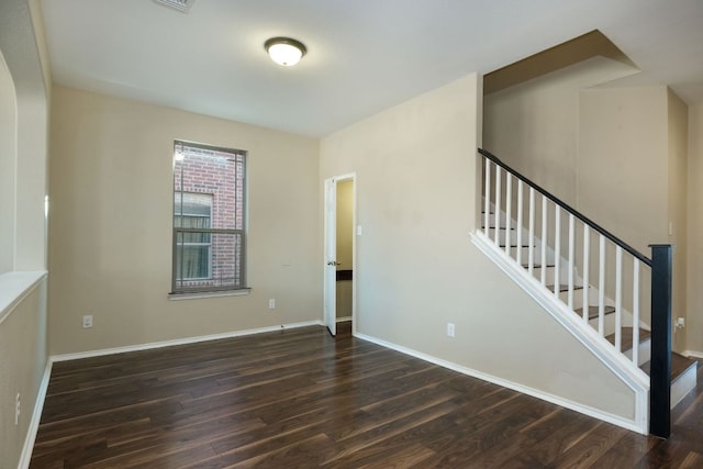 1244 Yellow Iris Rd, Leander, TX 78641 - unfurnished room featuring wood finished floors and stairway