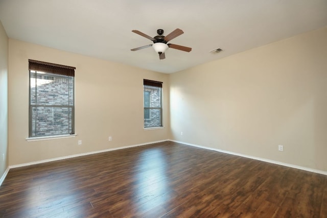 1244 Yellow Iris Rd, Leander, TX 78641 - unfurnished room featuring dark wood finished floors and a ceiling fan