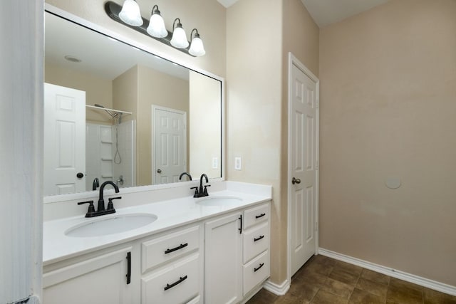 1244 Yellow Iris Rd, Leander, TX 78641 - bathroom with double vanity and a shower