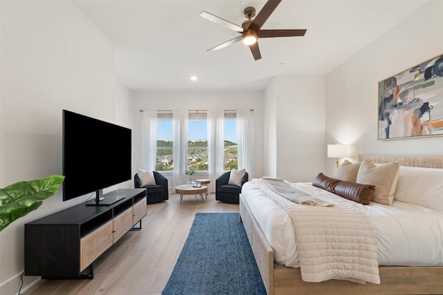 6901 Davenport Divide Rd, Austin, TX 78738 - bedroom with light wood-style flooring, recessed lighting, and ceiling fan
