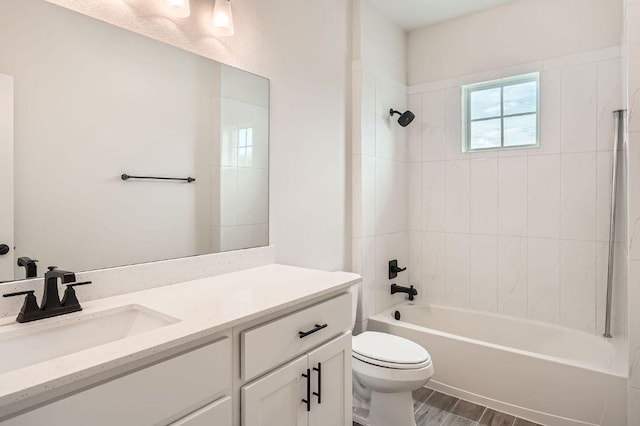 461 Constitution Way, Kyle, TX 78640 - full bathroom with toilet, vanity, bathtub / shower combination, and wood finished floors
