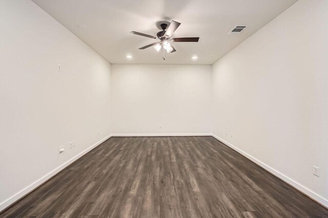 461 Constitution Way, Kyle, TX 78640 - spare room with ceiling fan, baseboards, dark wood-style floors, and recessed lighting