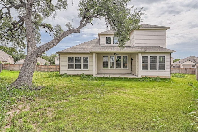 461 Constitution Way, Kyle, TX 78640 - rear view of property with a ceiling fan, a patio area, and roof with shingles