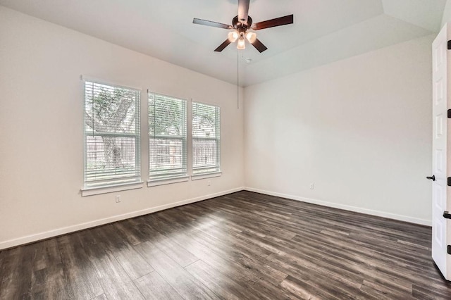 461 Constitution Way, Kyle, TX 78640 - empty room featuring a ceiling fan, dark wood-style floors, and baseboards