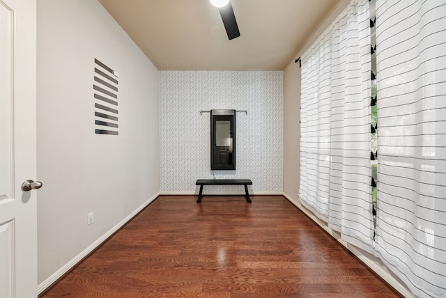 4404 Cierne Cv, Round Rock, TX 78681 - interior space with ceiling fan, wallpapered walls, wood finished floors, and baseboards